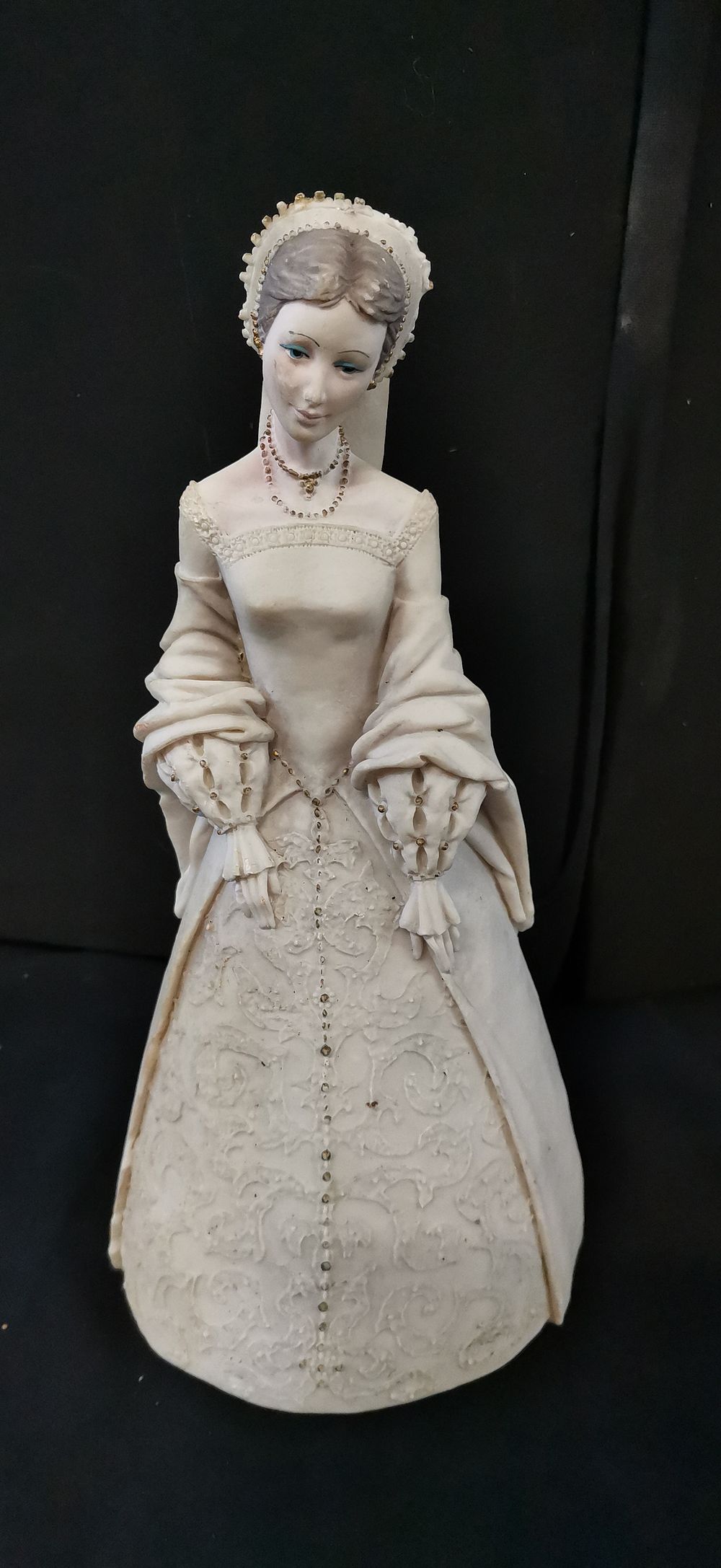 Lot 344: M. Salvatrini Off-white Figurine of a Woman in Historical Dress
