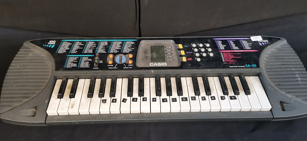 Lot 379: Casio SA-65 Song Bank Electronic Keyboard