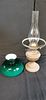 Antique Style Oil Lamp with Green Cased Glass Shade. An antique-style oil lamp featuring a deep Image - 1