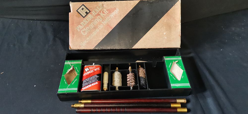 Lot 155: A Collection of Wood and Brass Gun Cleaning Components