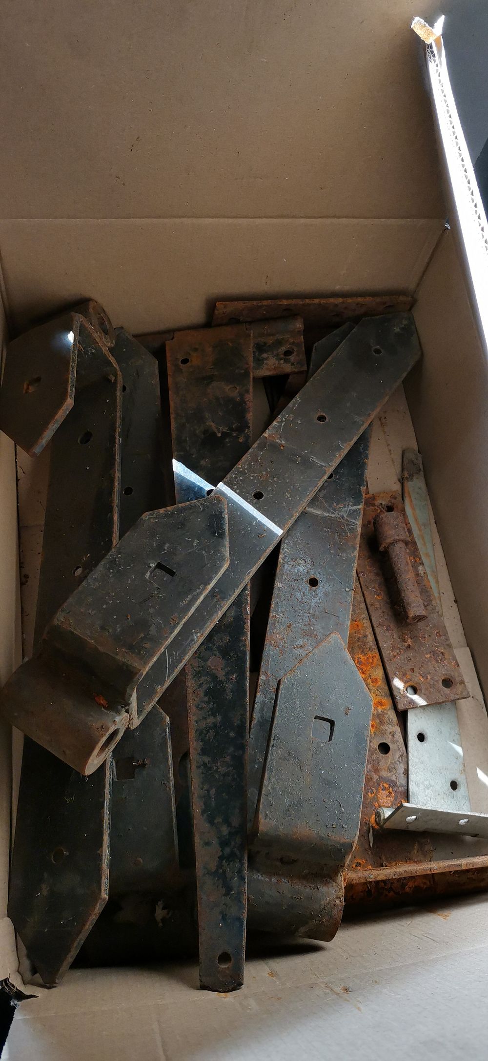 Lot 160: A Collection of Rusted Black Metal Gate and Strap Hinges