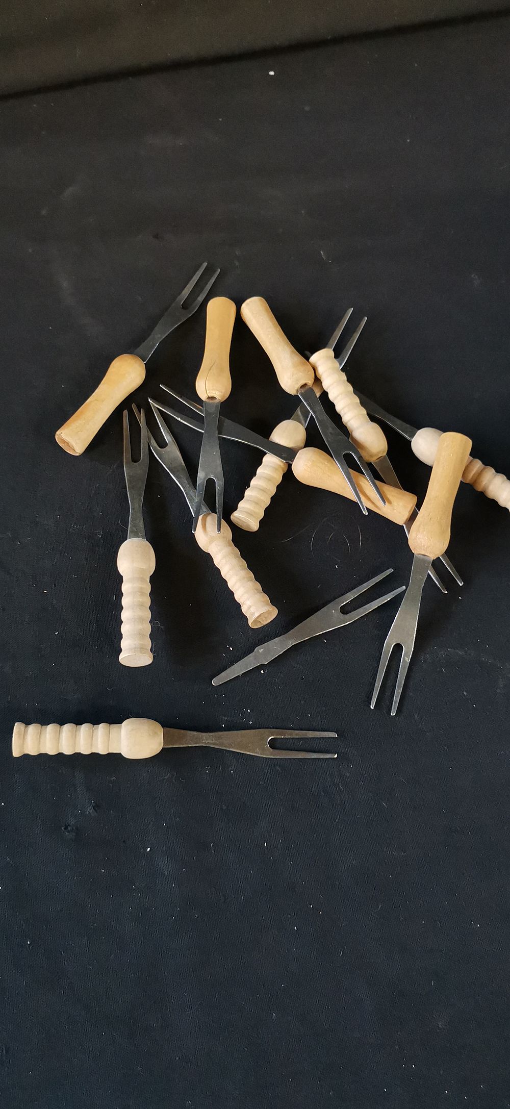 Lot 213: A Collection of Wooden Handled Appetizer Forks and Corn Holders