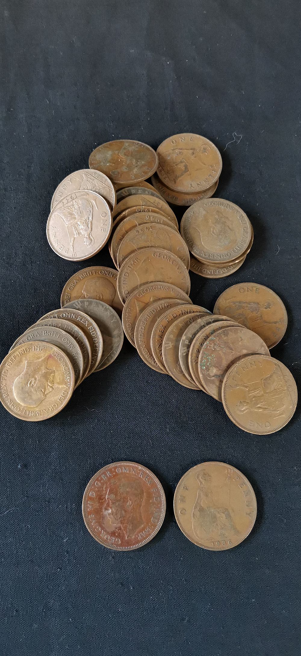 Lot 217: Thirty King George V British Bronze One Penny Coins