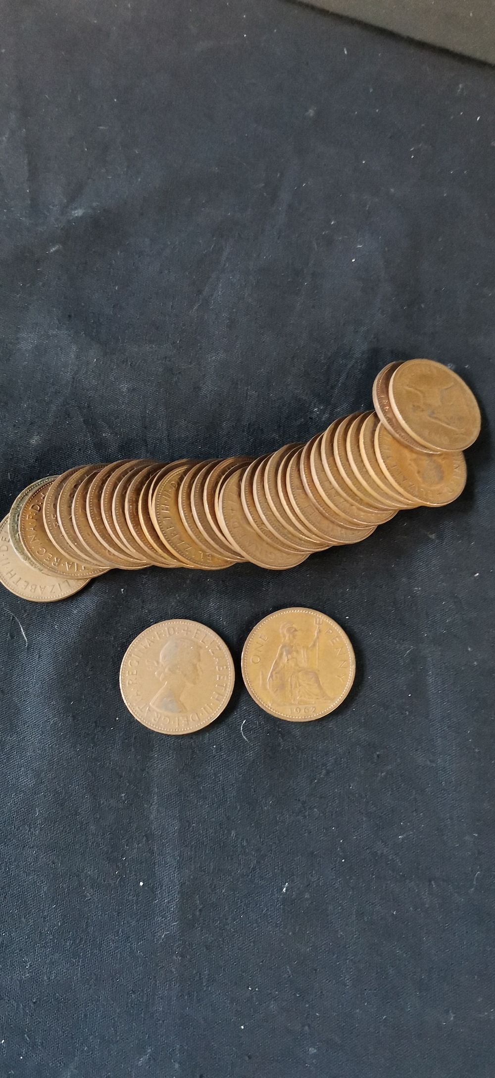 Lot 218: A Collection of 30 Elizabeth II British Bronze One Penny Coins