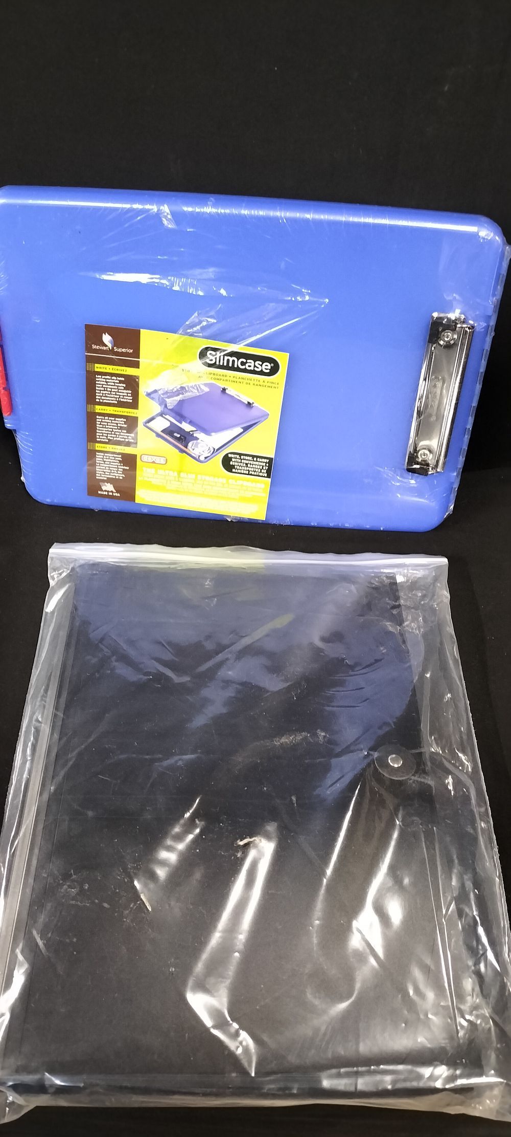 Lot 220: Two office accessories including a Stewart Superior Slimcase storage clipboard