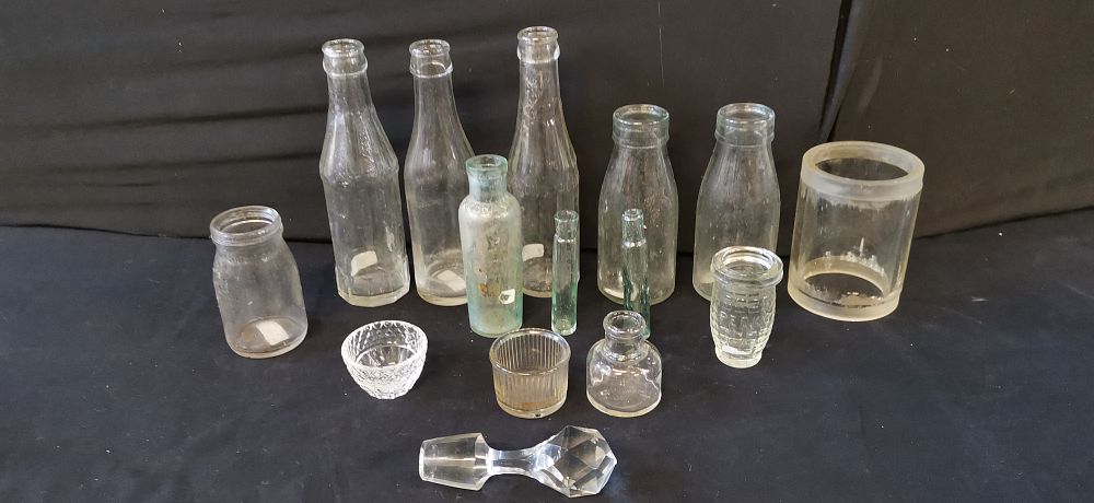Lot 228: A Collection of Vintage Glass Bottles and Jars