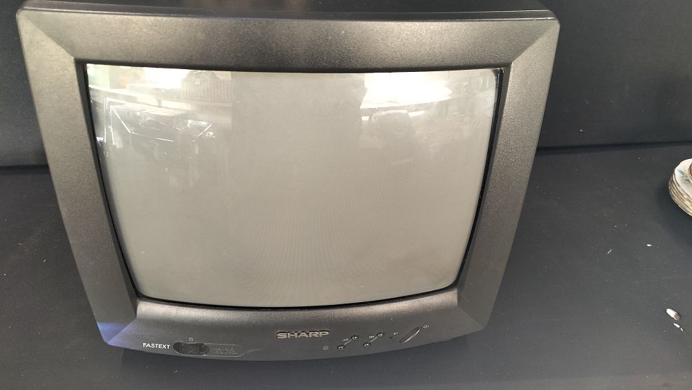 Lot 304: Sharp 37ET-35H Solid State Colour Television Receiver with Remote