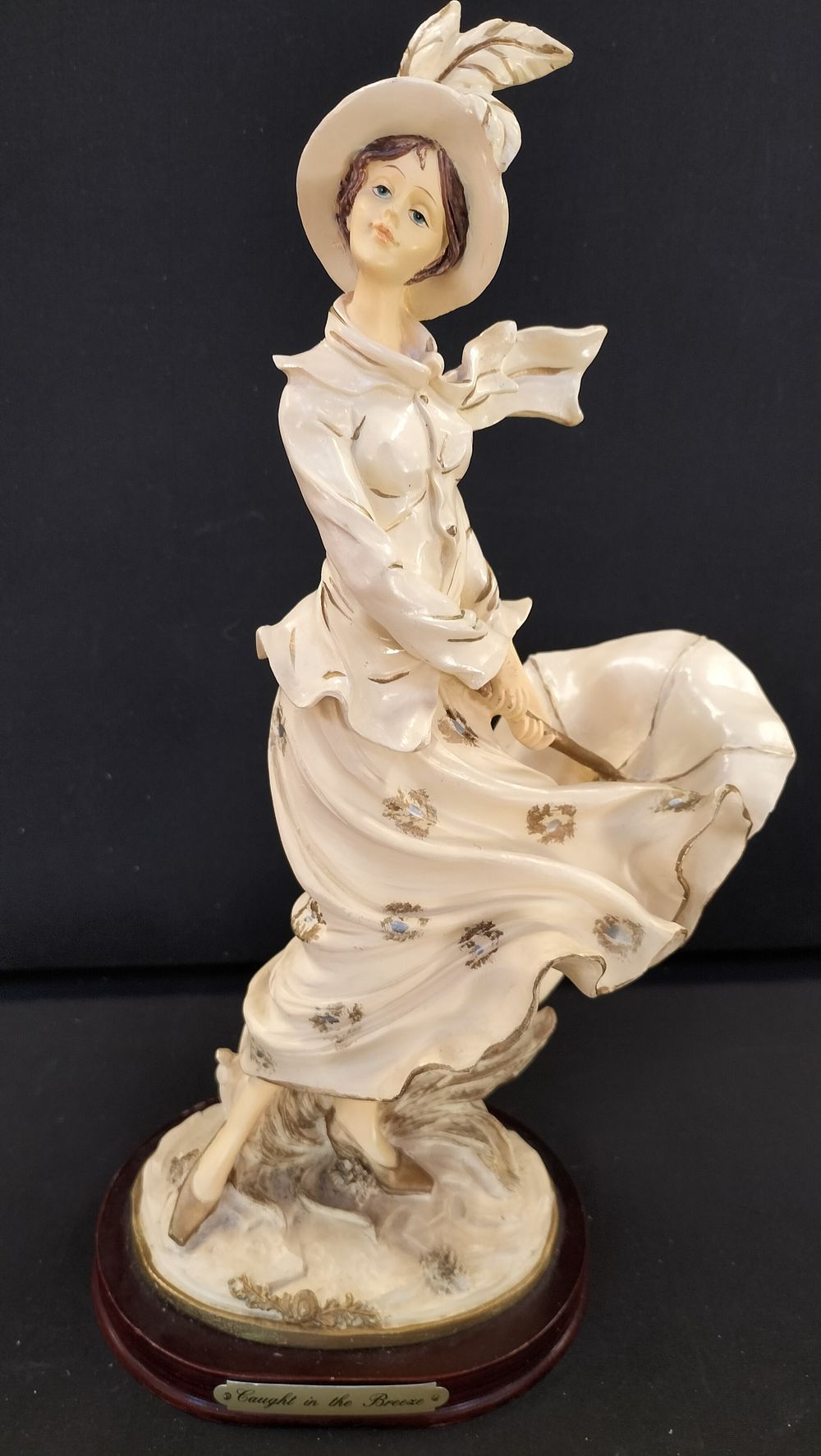 Lot 309: Caught in the Breeze Figurine on Wooden Base