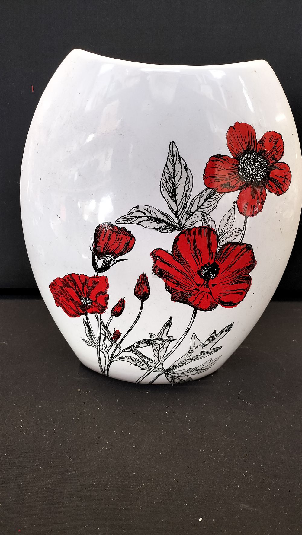 Lot 319: White ceramic vase with red poppy floral design
