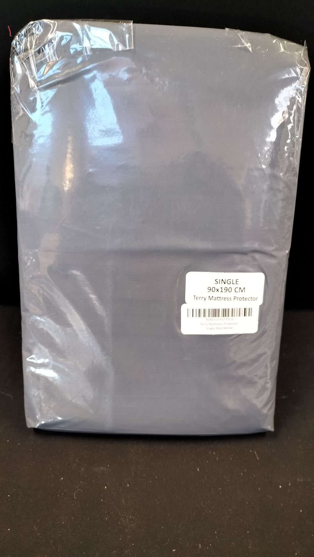 Lot 329: Brand New Single Grey Terry Mattress Protector 90x190cm