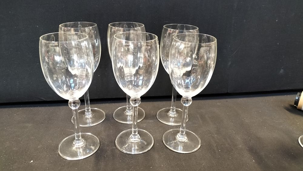 Lot 331: A set of six clear glass wine glasses