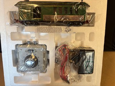 A Collection of Thomas Kinkade Christmas Express Train Components. A collection of model train 