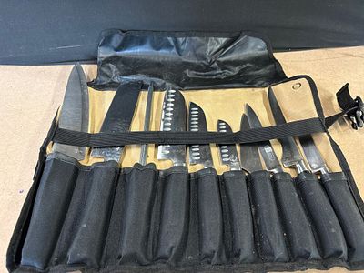 A 9-Piece Chefs Knife Set Including Sharpening Rod. A 9-piece chefs knife set including 