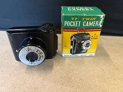 V.P. Twin Pocket Camera with Bloomed Bolco Lens and Box. A black V.P. Twin pocket camera 