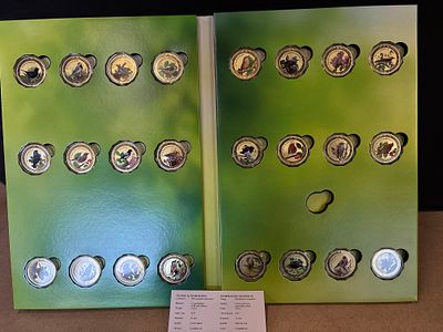 A Collection of 24 Gold Plated European Songbirds Medallions. A collection of 24 gold plated 