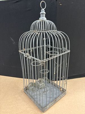 Vintage Style Metal Decorative Birdcage Tea Light Holder with Hexagonal Base. A vintage style 