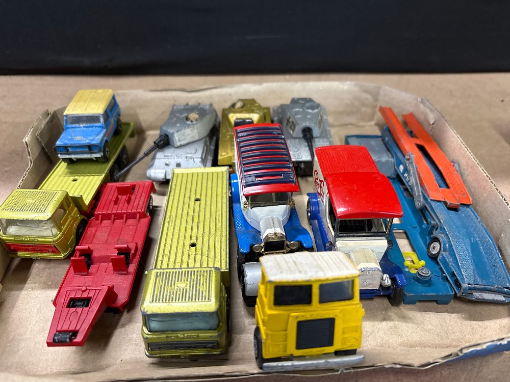 Lot 269: Matchbox, A Collection of 12 Vintage Die-cast Metal Vehicles, Mid-20th Century.
