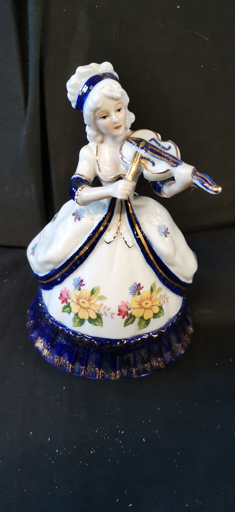 Lot 249: Porcelain Figurine Music Box of a Woman Playing Violin