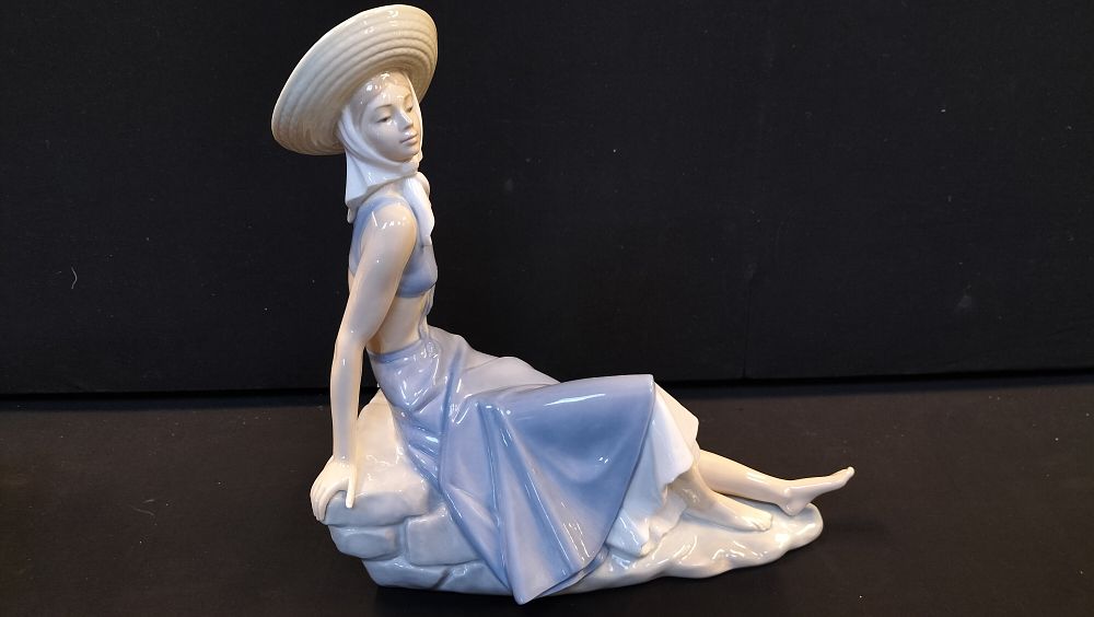 Lot 253: Nao by Lladro Figurine of Woman in Sun Hat