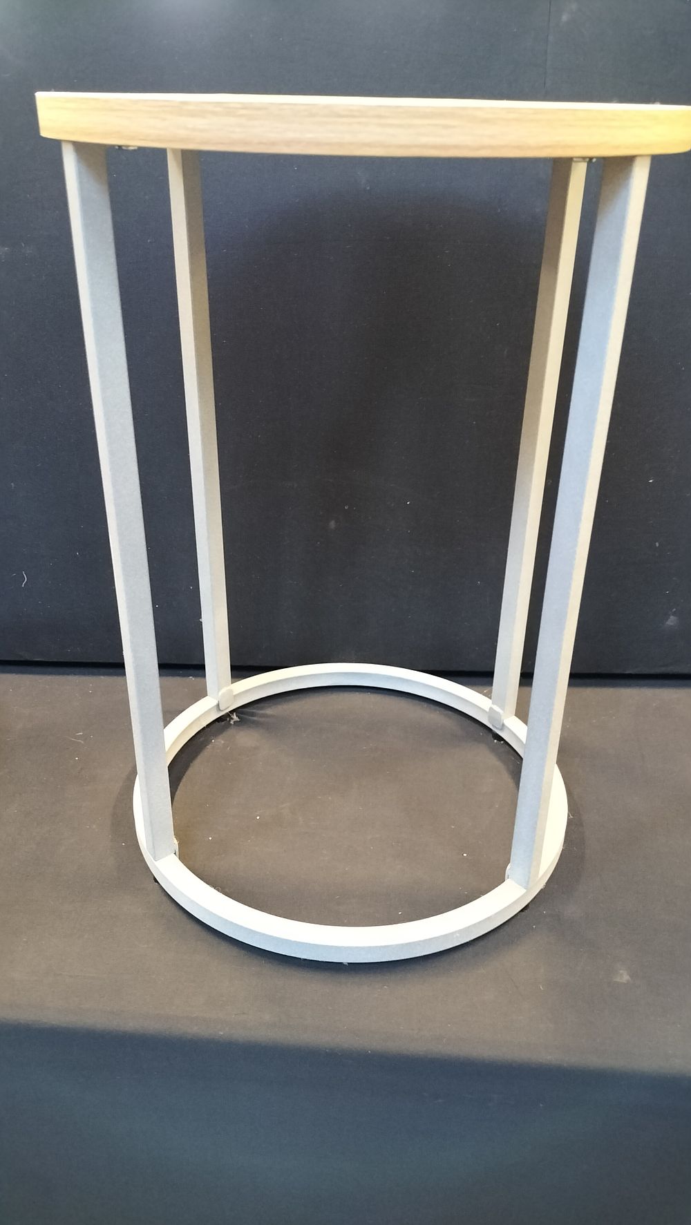Lot 254: Round side table with light wood top and white frame