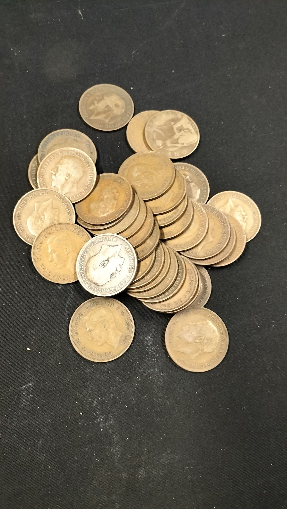 Lot 262: 30 King George V and VI One Penny Coins