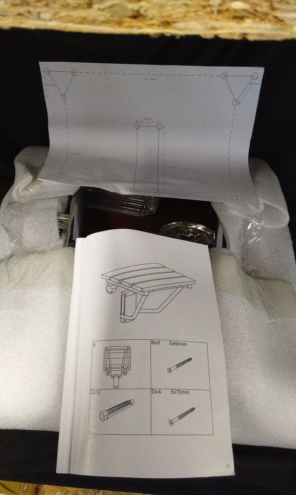 Lot 270: Wall-mounted folding shower seat with wood-grain slats
