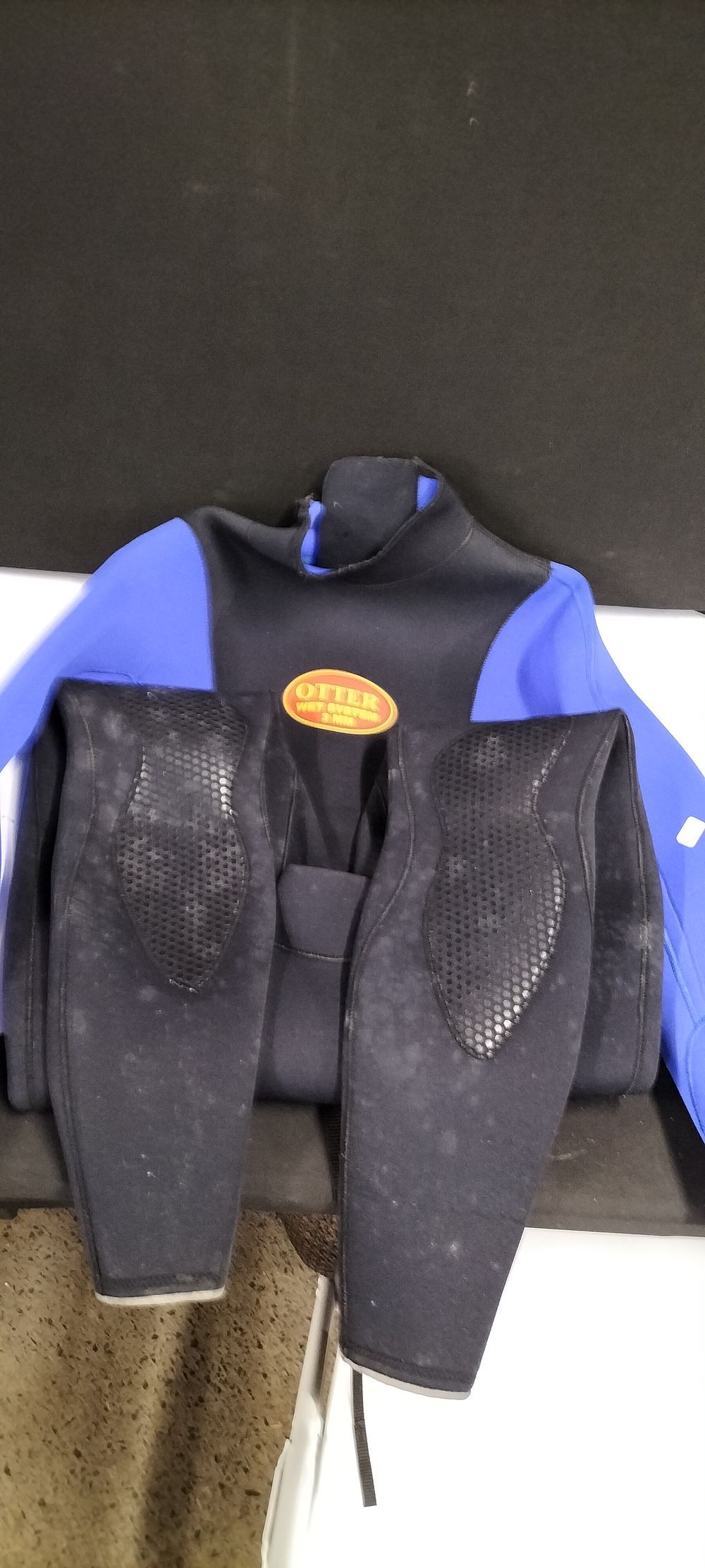 Lot 271: Otter Wet System 3mm Full Length Wetsuit. Size is Possibly Childs Large or Small Adult