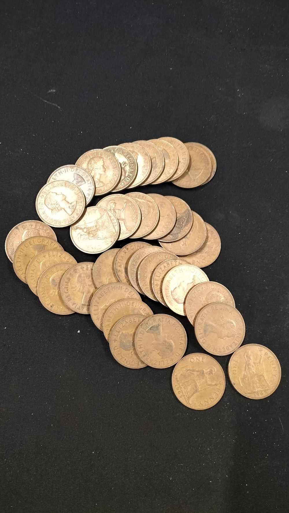 Lot 276: Thirty Queen Elizabeth II Great Britain One Penny Coins