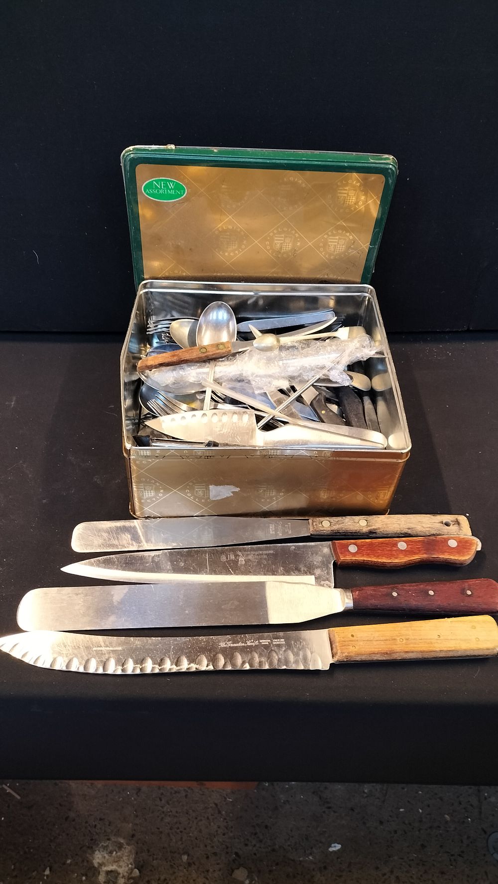 Lot 277: A Collection of Cutlery and Kitchen Utensils in Tin