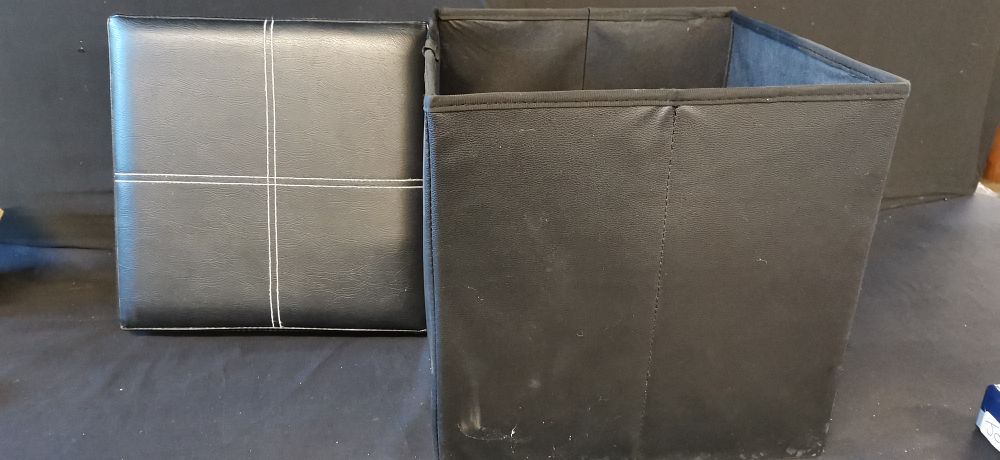 Lot 287: Black Collapsible Storage Ottoman with Padded Lid