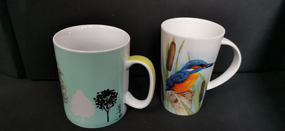 Lot 436: Two Decorative Ceramic Mugs including Lisa Stickley Design