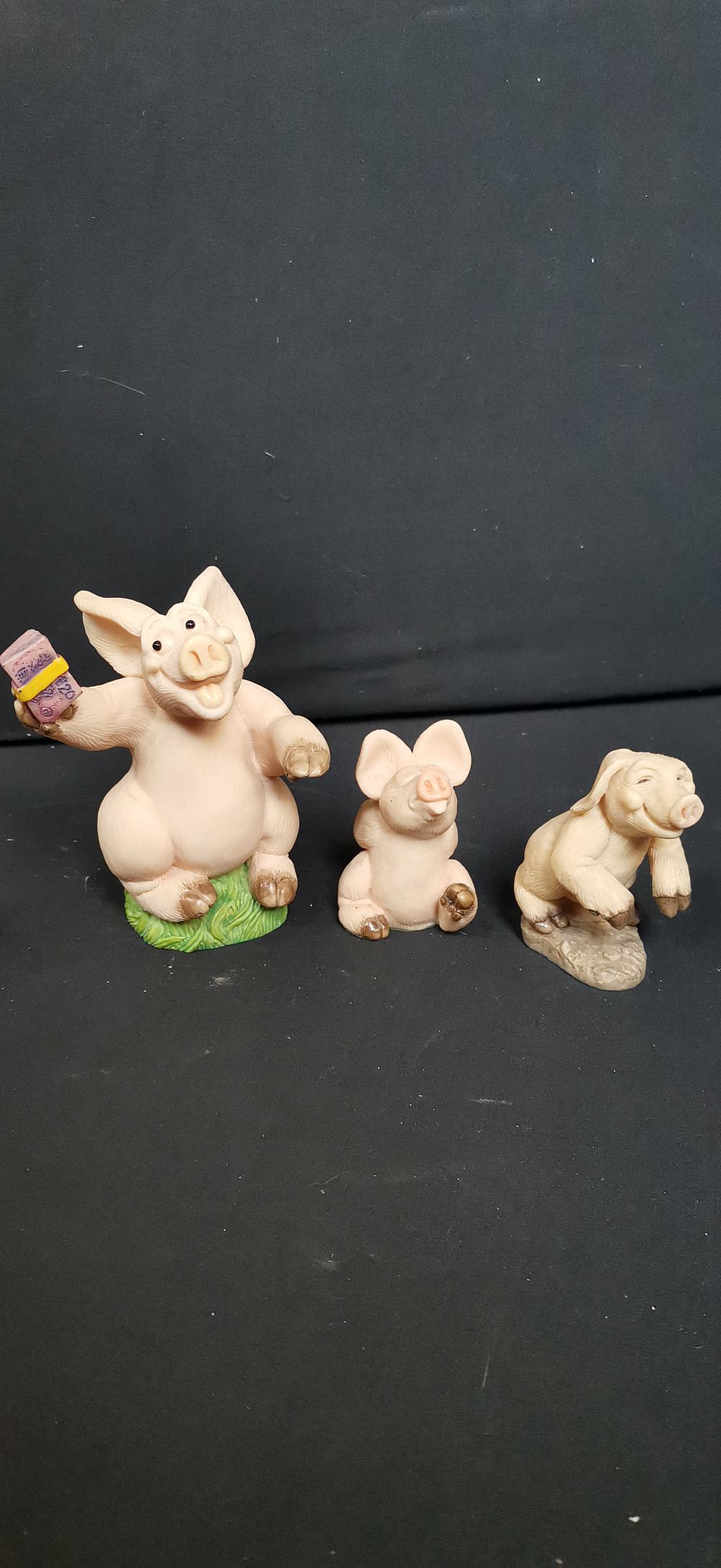 Lot 456: A Trio of Piggin Pig Figurines by David Corbridge