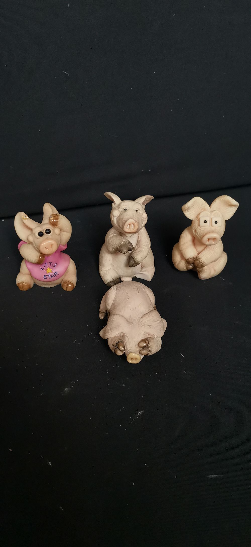 Lot 460: A Collection of Tan Pig Figurines
