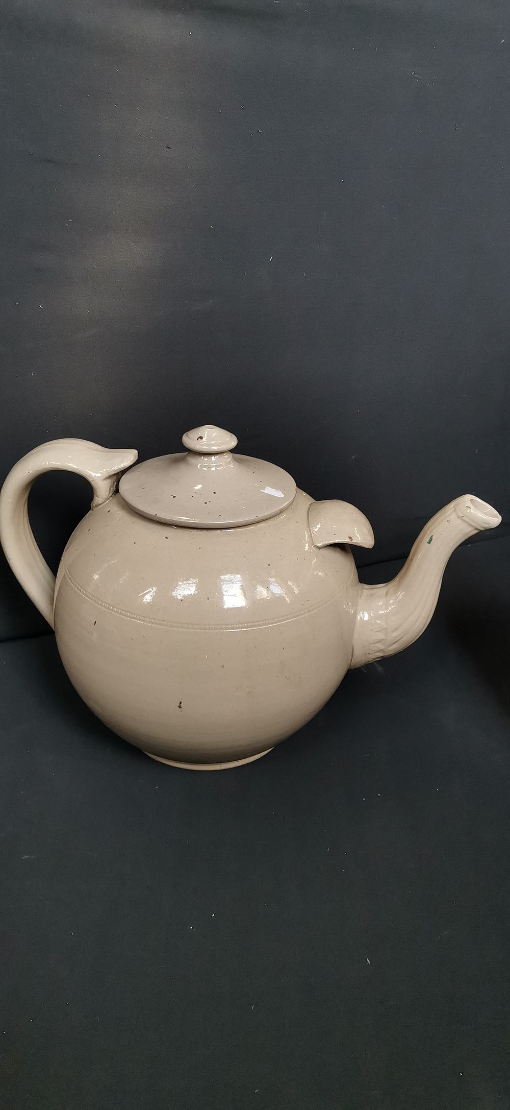 Lot 464: Large beige glazed ceramic teapot with matching lid