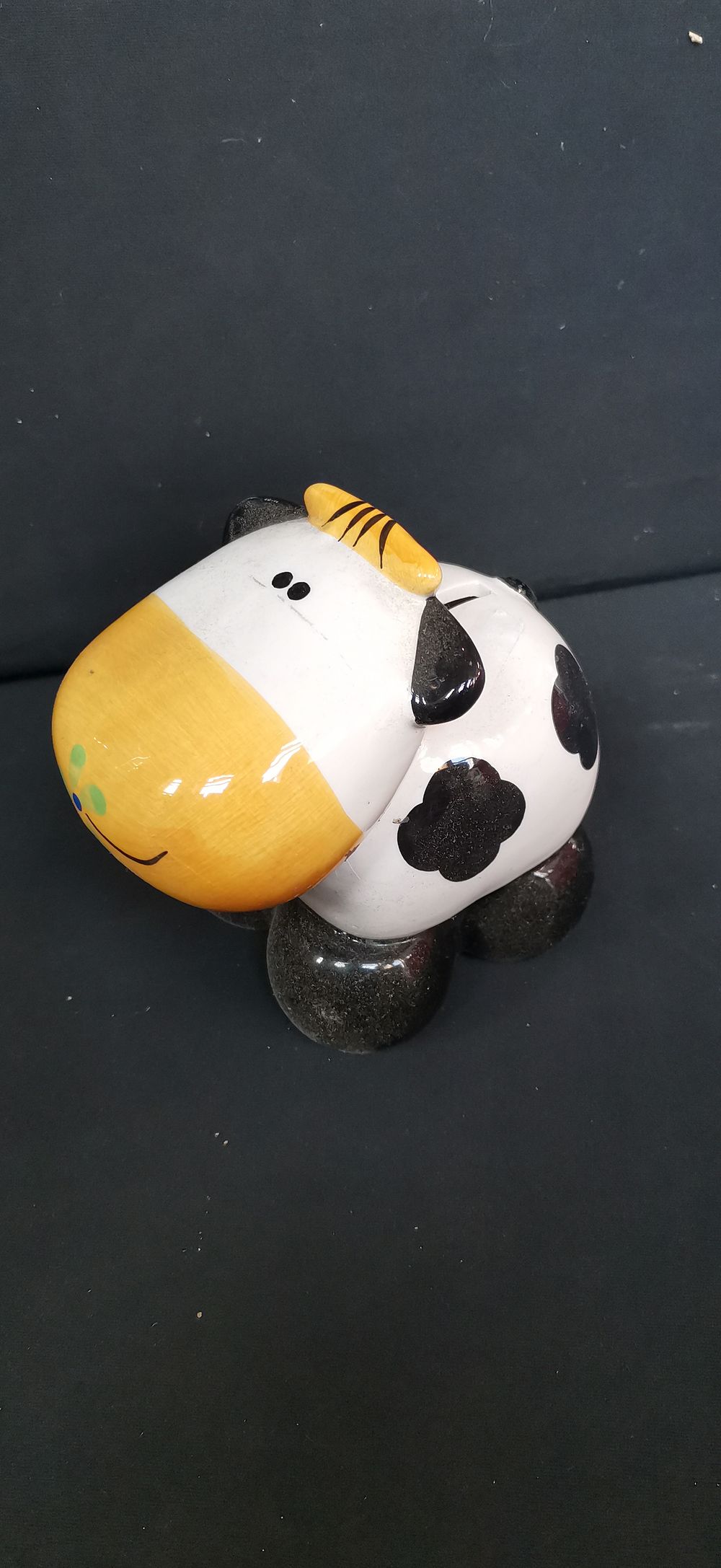 Lot 484: A Ceramic Cow Shaped Money Box