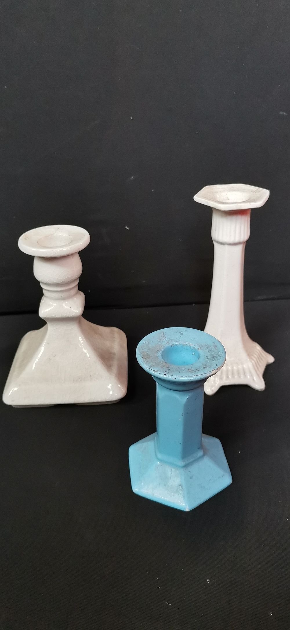 Lot 494: A Trio of Ceramic and Glass Candlesticks