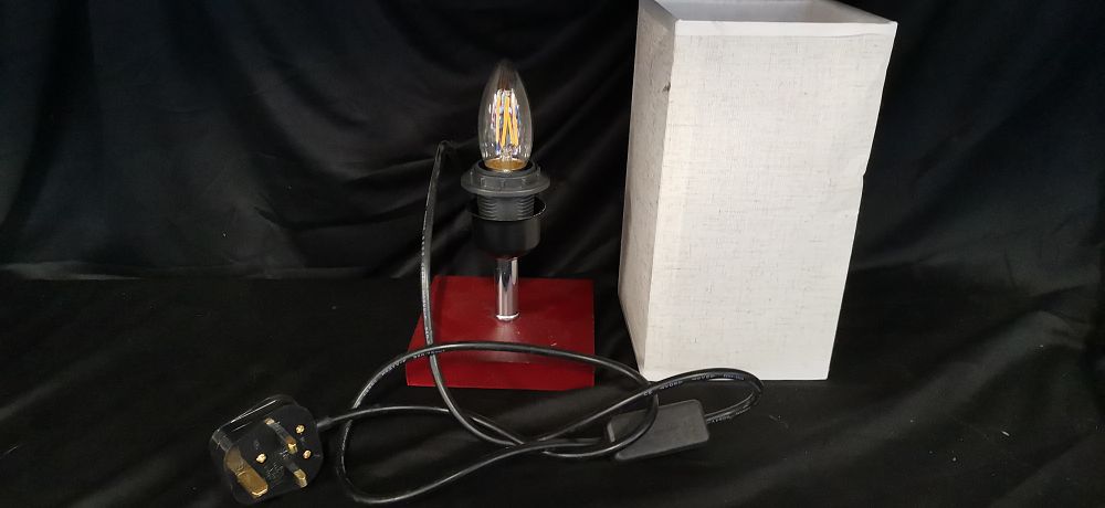 Lot 249: Table lamp with Wood base and white fabric shade