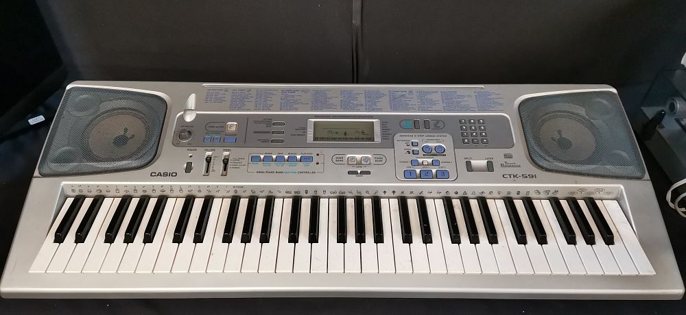 Lot 375: Casio CTK-591 61-Key Portable Electronic Keyboard. Untested no Power Supply