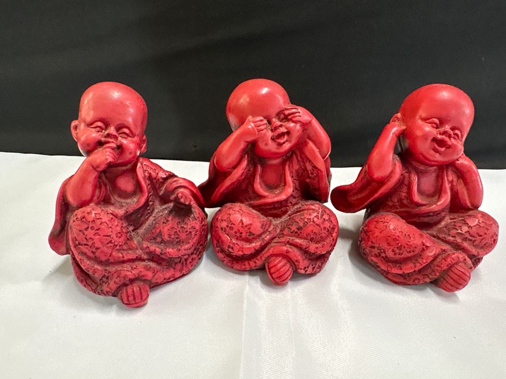Lot 180: Three Red Resin Three Wise Monks Buddha Figurines