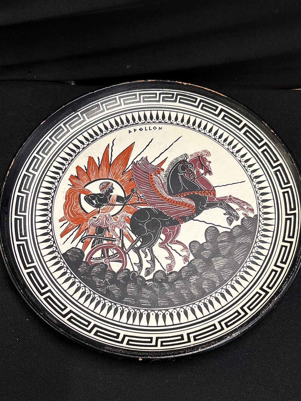 Lot 202: A Neo-Attic Style Terracotta Greek Plate Depicting Apollo