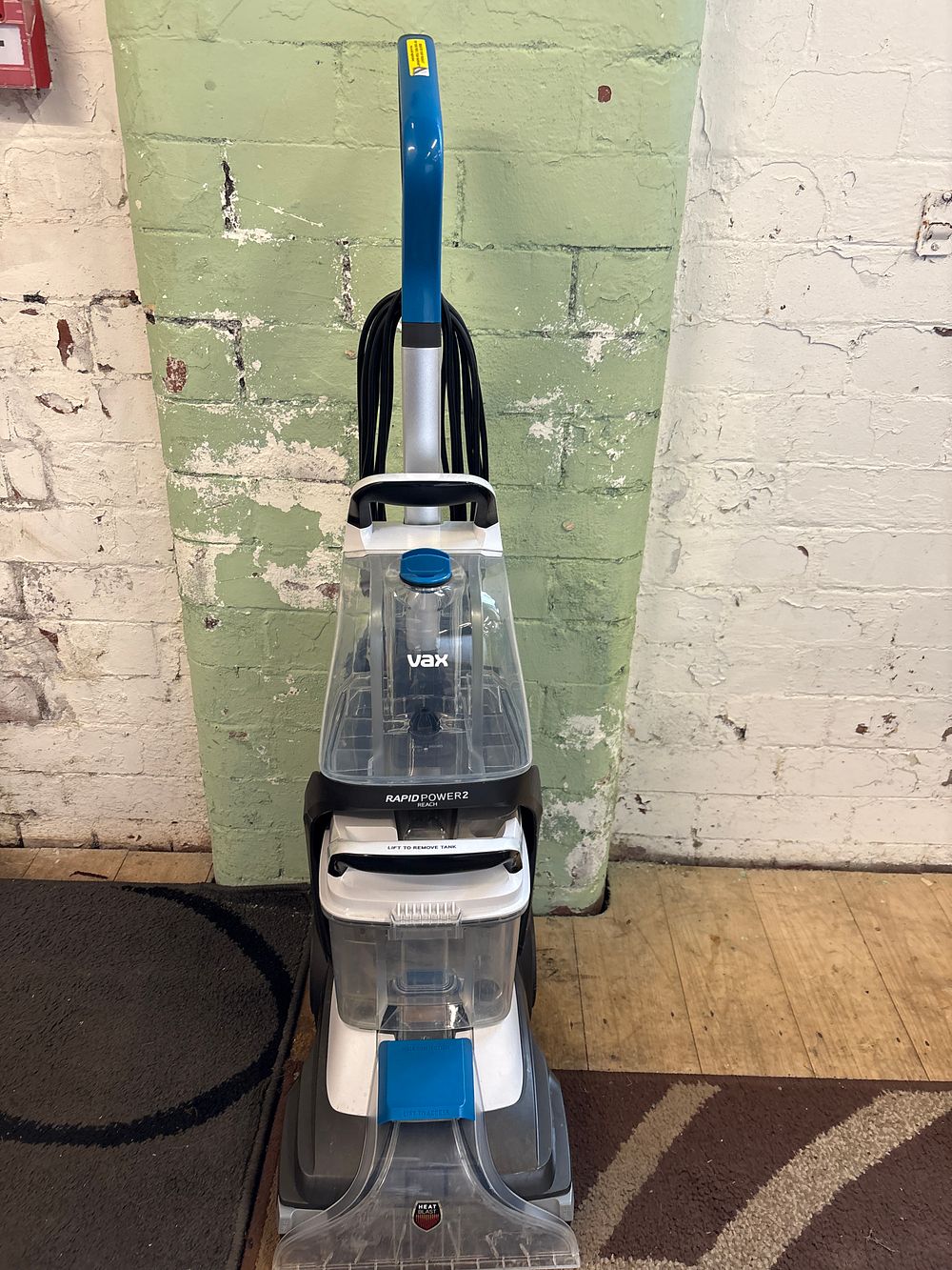Lot 222: A Vax Rapid Power 2 Reach upright carpet cleaner