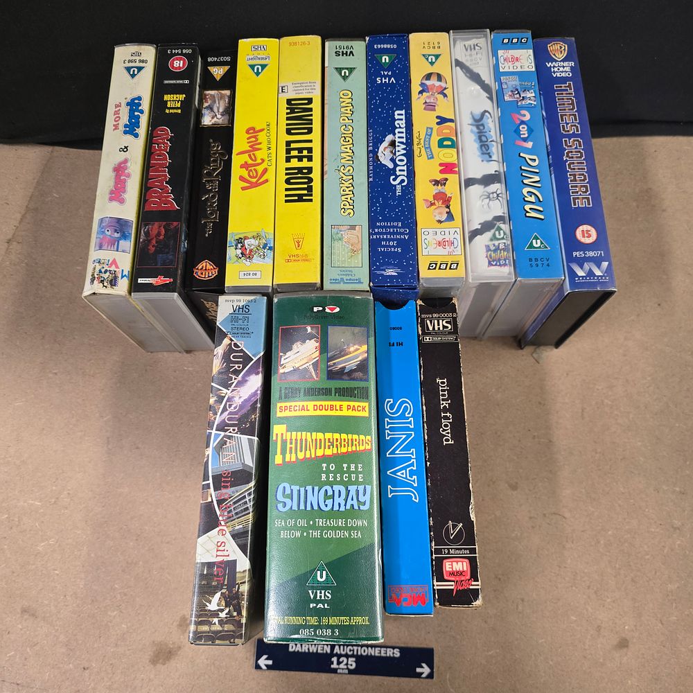 Lot 237: Various Publishers, Collection of VHS Tapes Featuring Children's, Music, and Cult Film Titles, c. 1980s-2000s