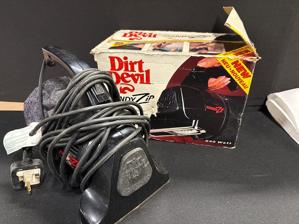 Lot 270: Dirt Devil Handy Zip Handheld Vac with Original Box, circa 1990s