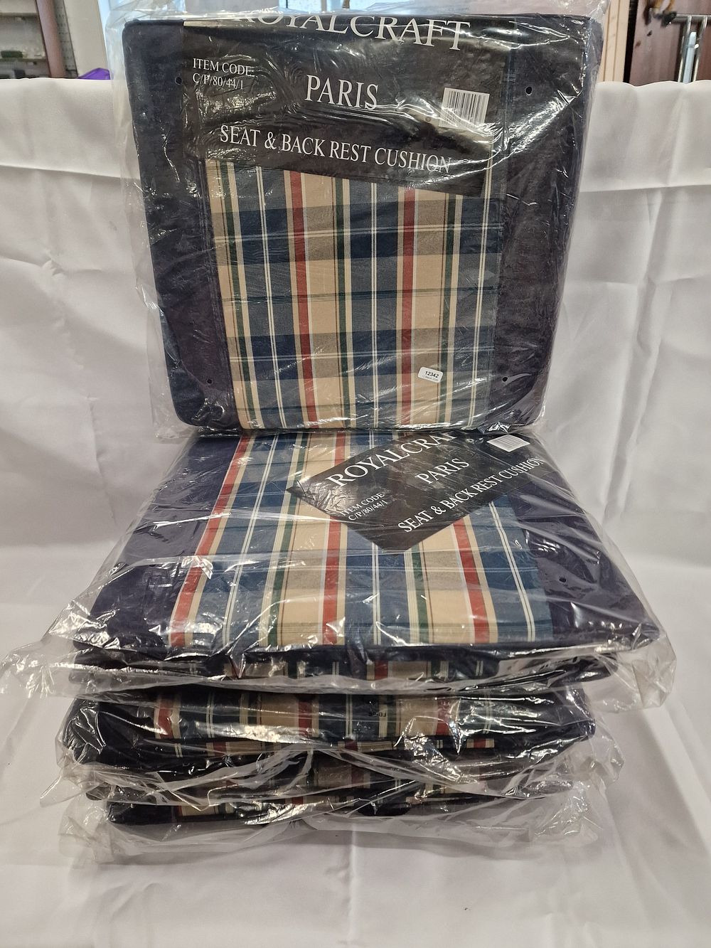 Lot 299: A Set of Four Royalcraft Paris Garden Seat and Backrest Cushions in Plaid Pattern
