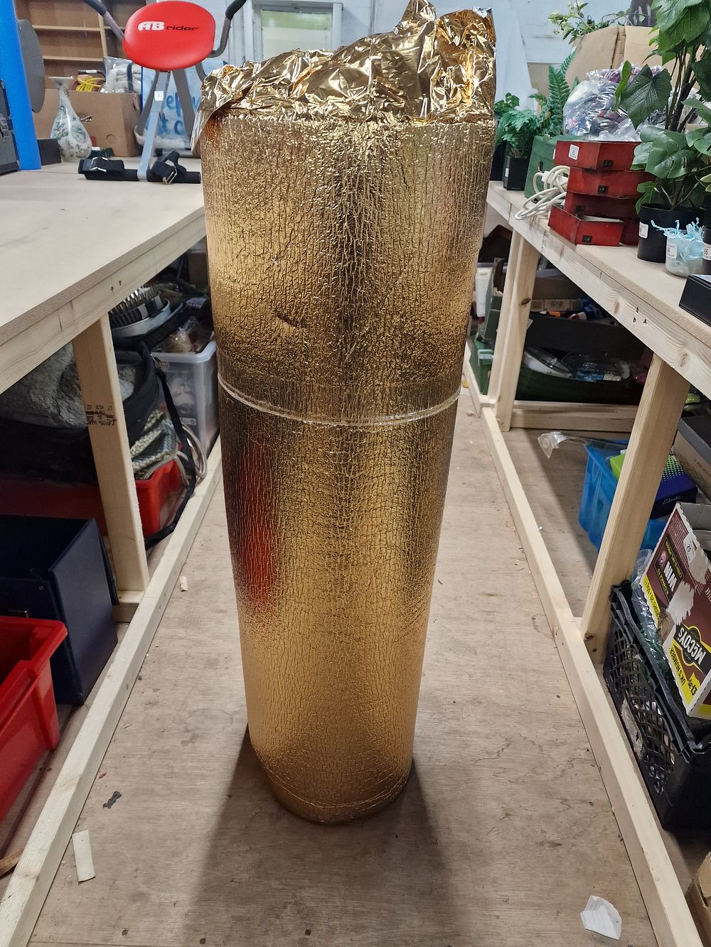 Lot 312: A Roll of Gold-Toned Reflective Thermal Insulation Underlayment