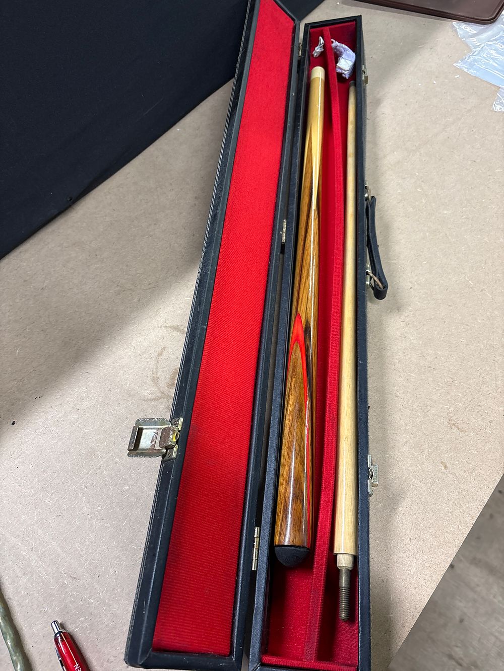 Lot 269: Anonymous Two-Piece Wood Snooker Cue with Red Flame Motif and Case, Late 20th Century