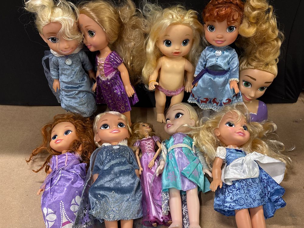 Lot 297: Ten Disney Animators Collection and Toddler Princess Dolls