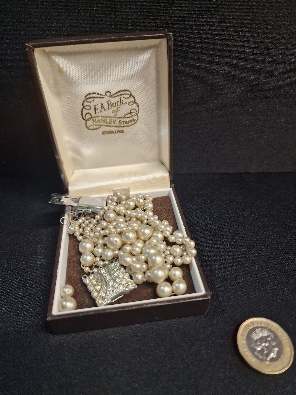Lot 354: Silver-tone multi-strand simulated pearl necklace with paste-set clasp