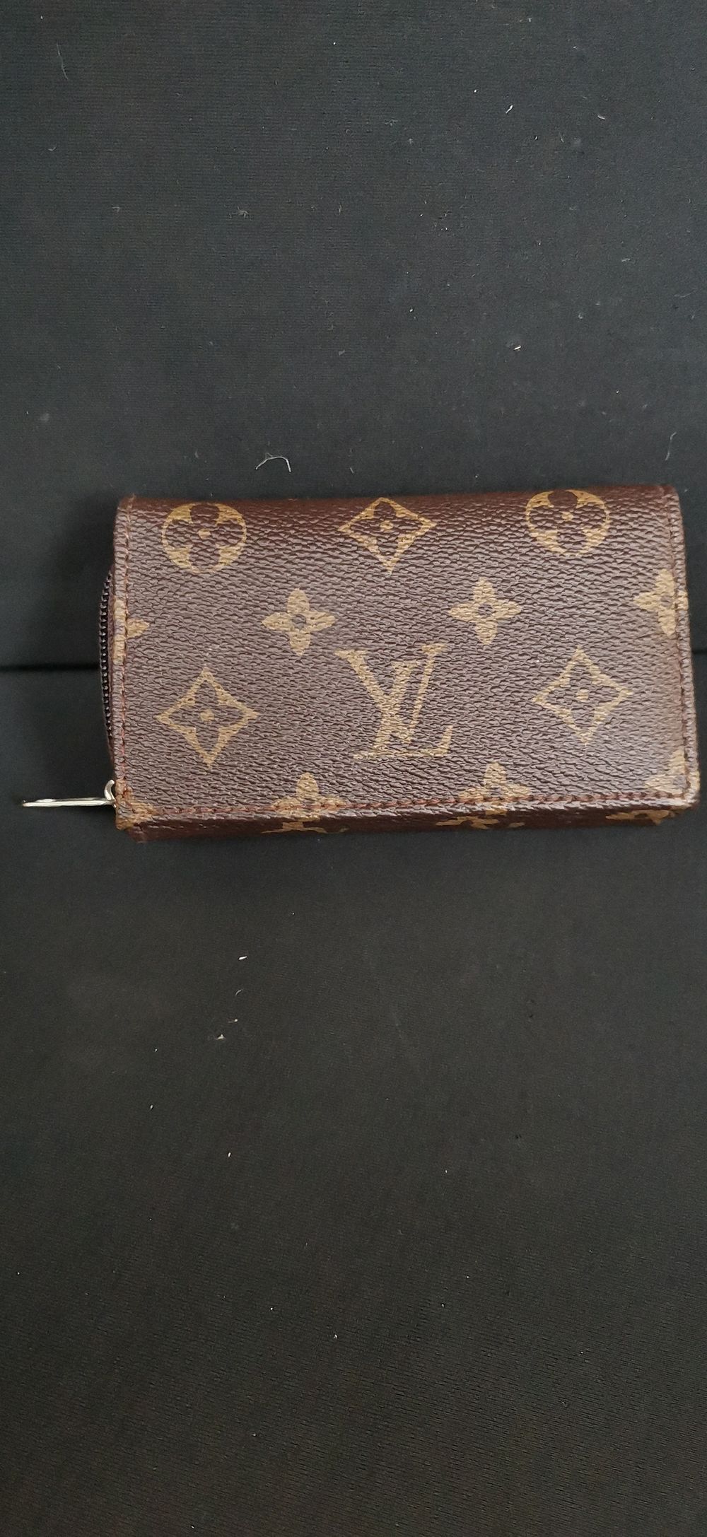 Lot 209: Louis Vuitton Monogram Canvas Trifold Wallet