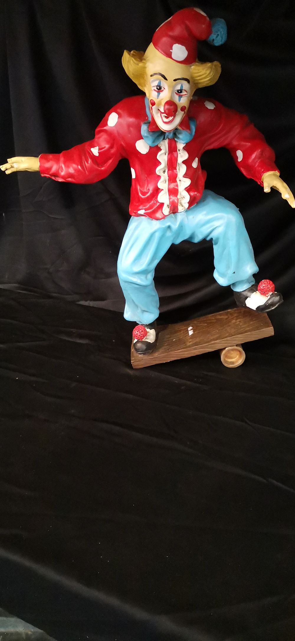 Lot 172: Decorative Clown Figurine Riding a Skateboard